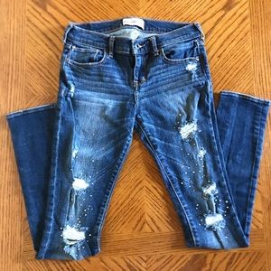 ABERCROMBIE KIDS DISTRESSED SKINNY JEANS